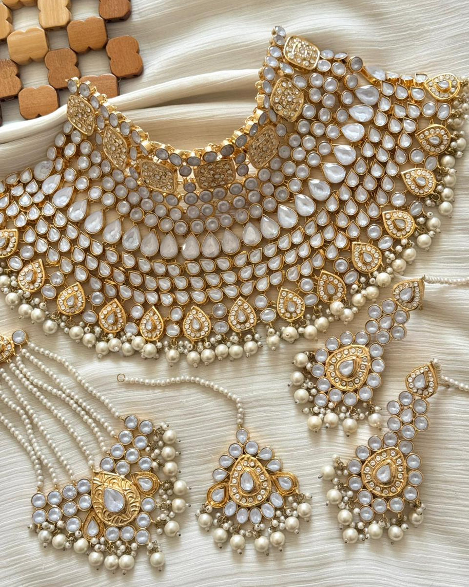 &nbsp;Zeenat-e-Ishq Designer’s Gold Plated Zircon Bridal Set